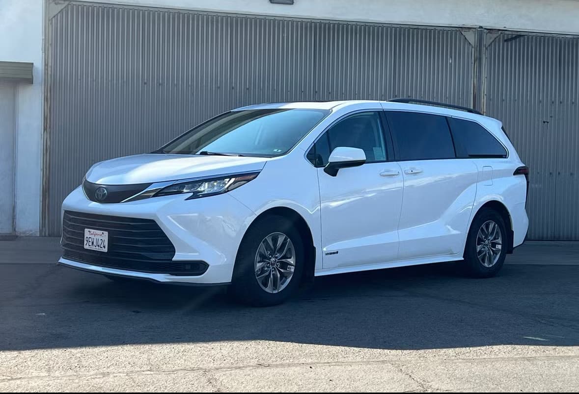 White Toyota Sienna rental car