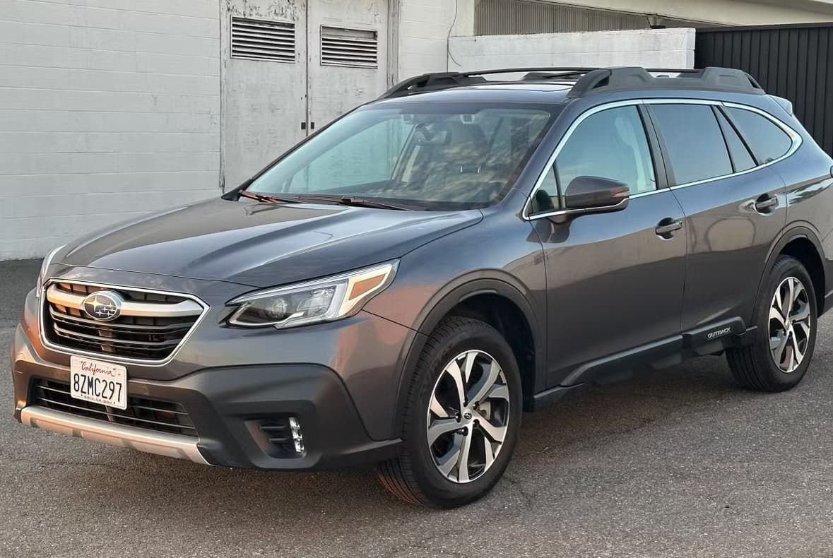 Grey Subaru Outback rental car