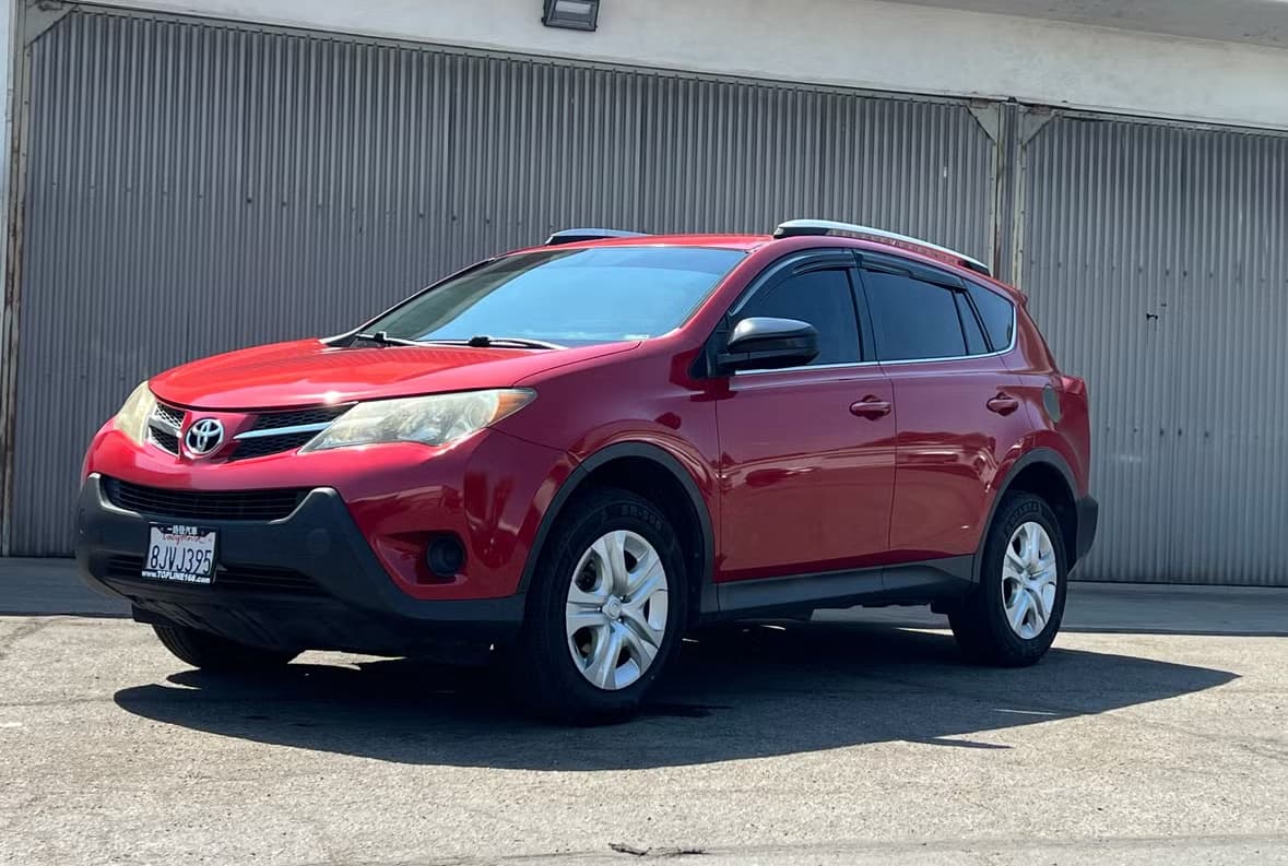 Red Corolla RAV4 rental car
