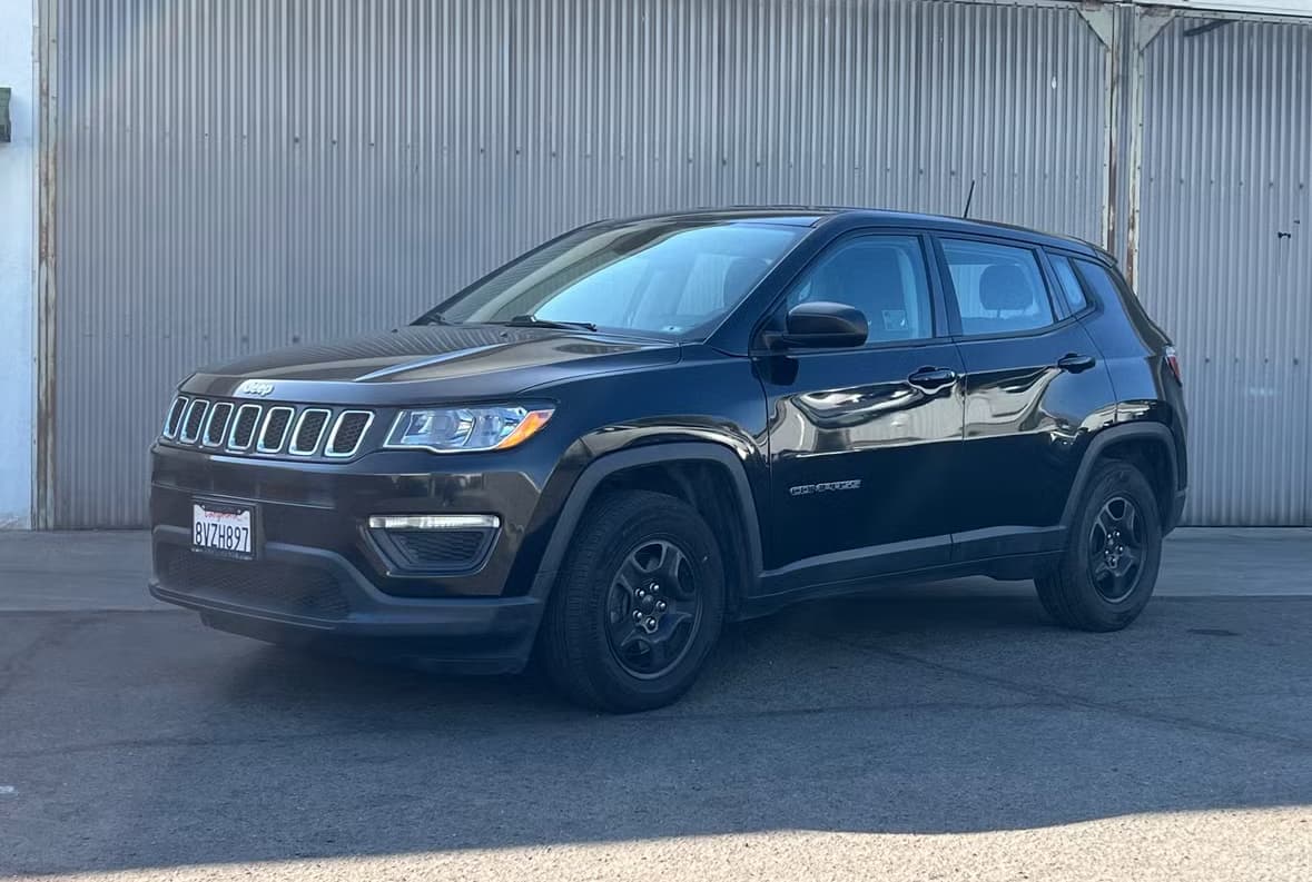 Black Jeep Compass rental car